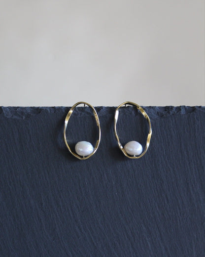 Aros movimiento perlas oro